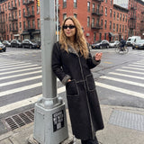 Black shearling long coat with grey wool trim