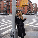 Black shearling long coat with grey wool trim